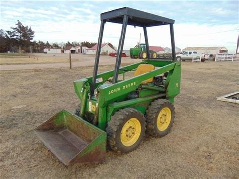 john deere 70 skid steer attachments|john deere 70 loader manual.